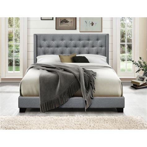 It features a rectangular panel headboard with rounded corners and tight channel tufting for a subtle retro-inspired look that we love. . Gloucester upholstered standard bed